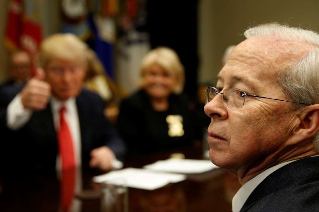 Then acting US Attorney General Dana Boente attends a meeting with county sheriffs at the White House on February 7 as US President Donald Trump gives a thumbs up. Photo: Reuters
