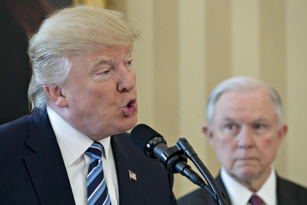 US President Donald Trump speaks at Jeff Sessions’ swearing in as US attorney general in the Oval Office of the White House on February 9. Photo: Bloomberg