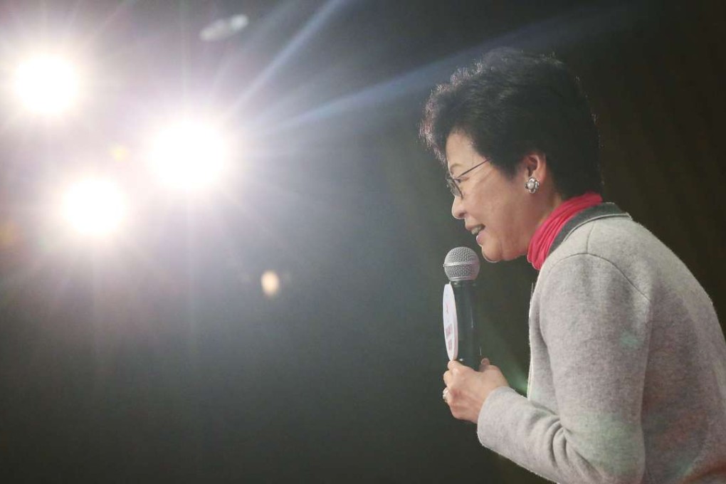 Carrie Lam attends the All-China Women’s Federation Hong Kong Delegates Association session in Yau Ma Tei. Photo: K. Y. Cheng