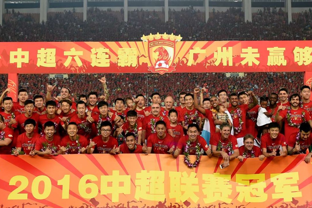 Guangzhou Evergrande celebrate winning the Chinese Super League for a sixth straight season in 2016. Photo: Xinhua