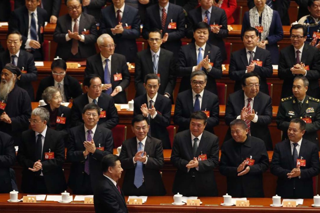 Chinese President Xi Jinping walks in for the opening session of the Chinese People's Political Consultative Conference in Beijing. Photo: AP