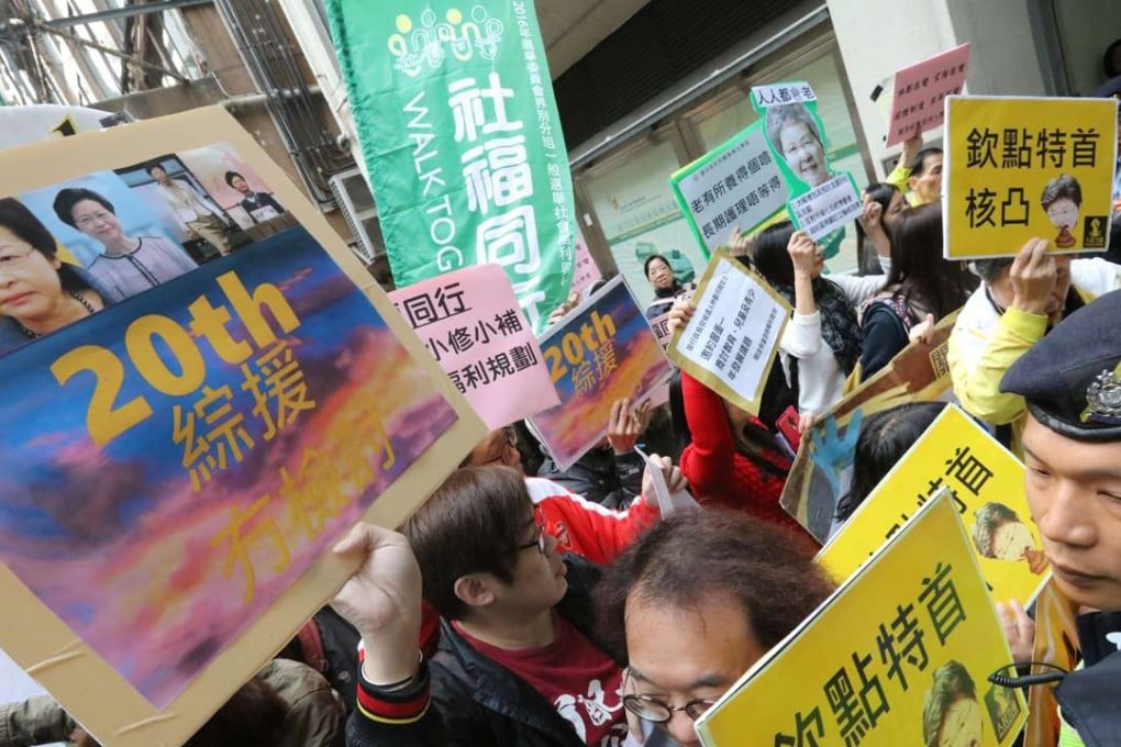 Protesters from grassroots and pro-workers’ groups were upset that Carrie Lam’s team decided to bypass them at a forum organised by the welfare sector in Wan Chai on Friday. Photo: Felix Wong