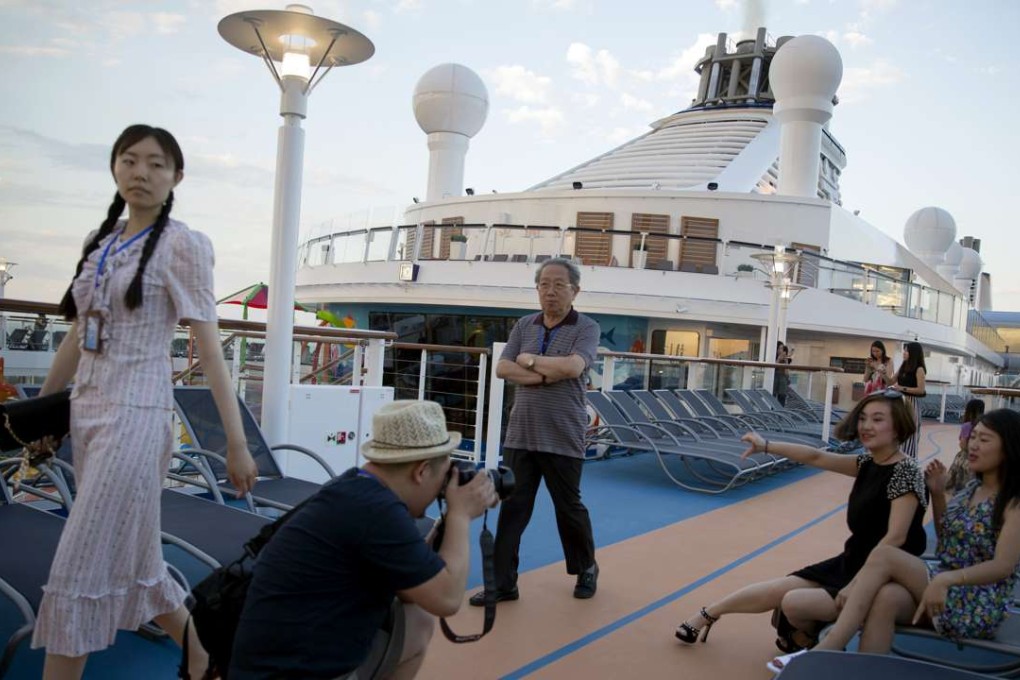 A file picture of Chinese passengers on a cruise ship calling at the northern port of Tianjin. Photo: AP
