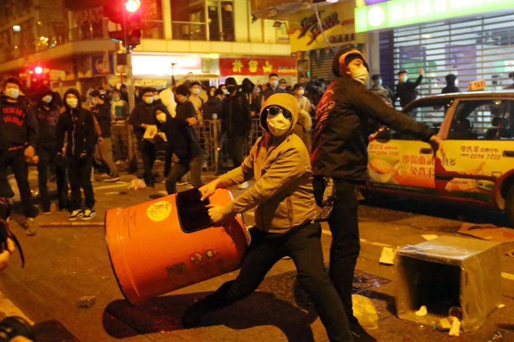 Dozens of protesters gathered on Nathan Road near Soy Street on February 9 last year after a confrontation with police over hawker control. Photo: Edward Wong