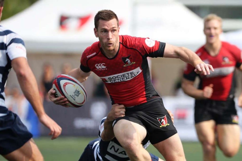 Doug Fluker prepares to offload in his side’s semi-final win over HKFC in the Hong Kong Premiership. Photo: Edward Wong