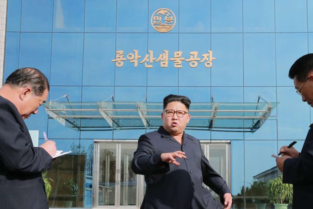 Kim Jong-un at the Ryongaksan Mineral Water Factory. Photo: Xinhua