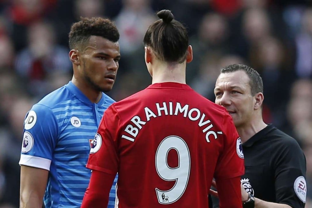 Manchester United's Zlatan Ibrahimovic and Bournemouth's Tyrone Mings are spoken to by referee Kevin Friend. Photo: Reuters