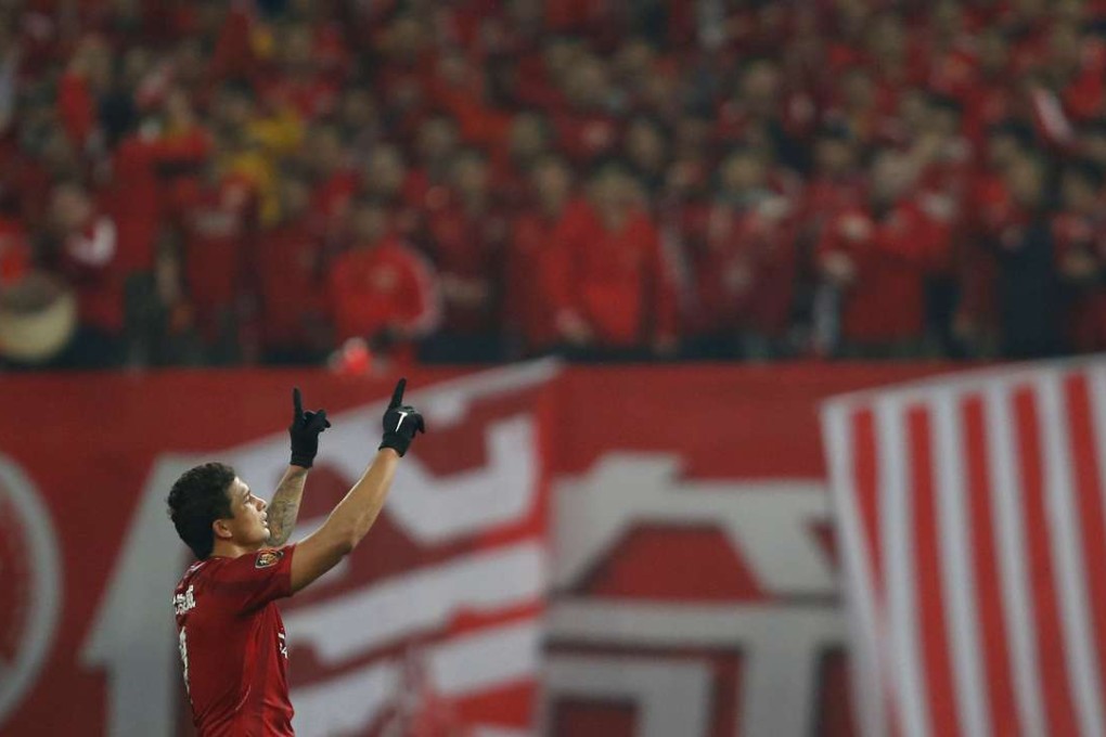 Shanghai SIPG's Elkeson celebrates after scoring against Changchun Yatai. Photo: Reuters