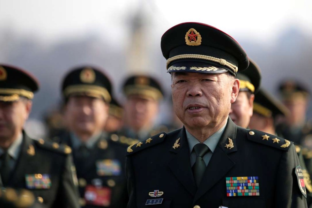 Military deputies prepare to head into the Great Hall of the People for the start of the National People's Congress in Beijing, on Sunday. Photo: Reuters
