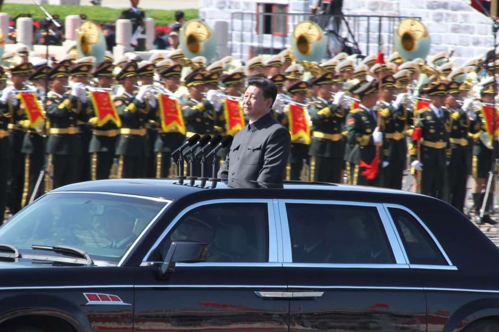 Xi Jinping reviews the parade soldiers at the military parade in Tiananmen Square in Beijing. Photo: Simon Song