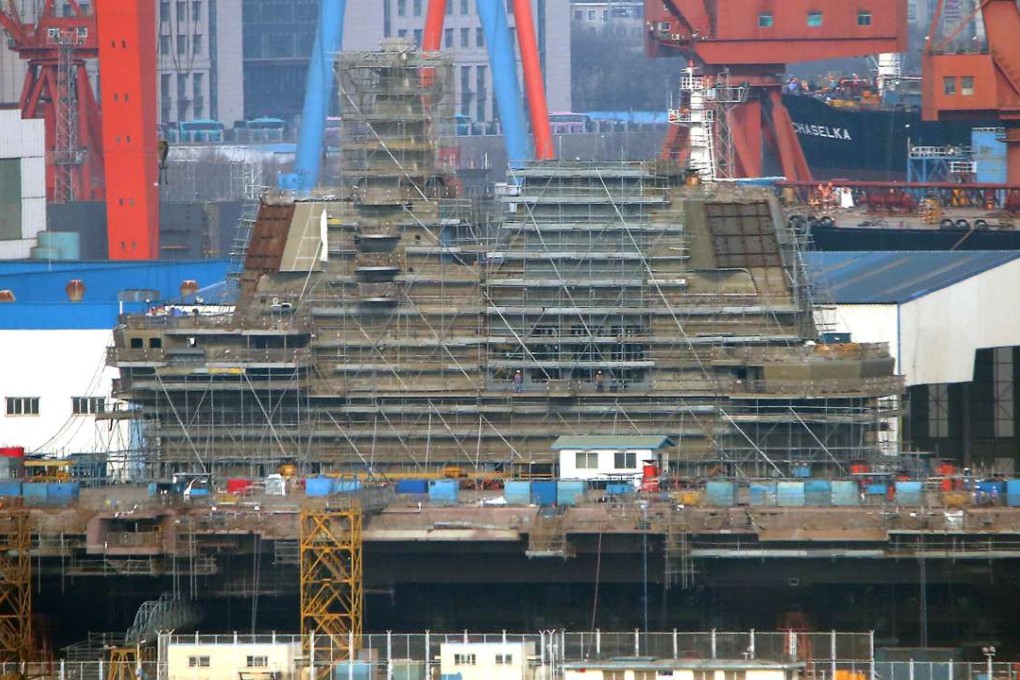 China's second aircraft carrier, temporarily called the 001A, under construction in Dalian, Liaoning province. Photo: ChinaFotoPress