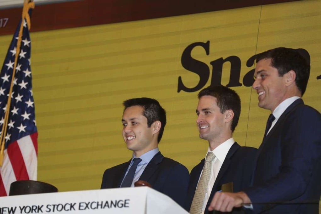 Snap co-founder Bobby Murphy (left) and chief executive Evan Spiegel (centre) prepare to ring the opening bell at the New York Stock Exchange on March 2. Snap is the largest technology initial public offering since Alibaba. Photo: Xinhua
