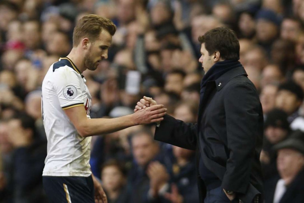 Tottenham's Harry Kane shakes hands with manager Mauricio Pochettino after he is substituted in the second half. Photo: Reuters