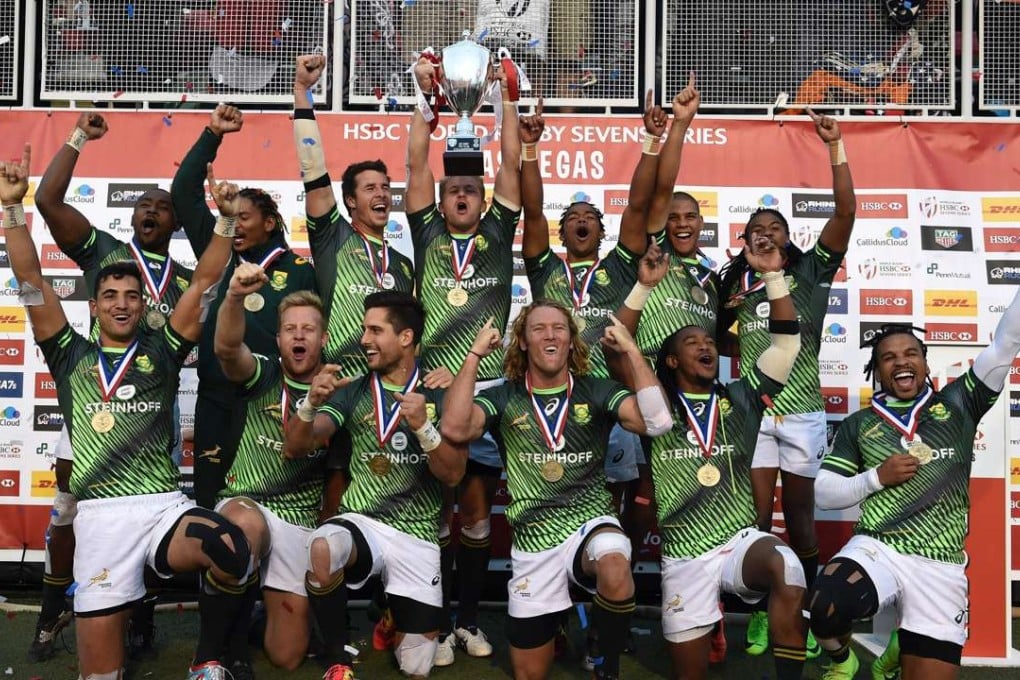 The South African team celebrates the Cup Final championship after defeating Fiji, 19-12, on day three of the USA Sevens Rugby tournament, part of the World Rugby Sevens Series, March 5, 2017 in Las Vegas, Nevada. / AFP PHOTO / David Becker
