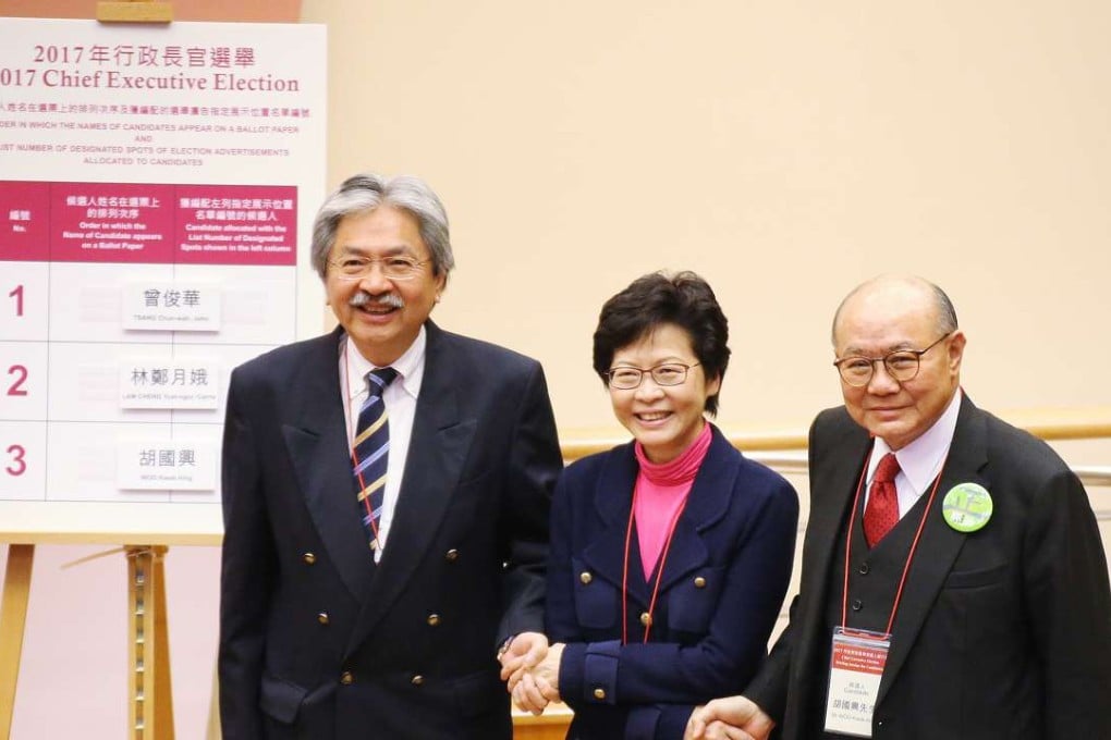 Candidates John Tsang, Carrie Lam and Woo Kwok-hing attend a briefing in Mong Kok on Sunday to determine the order of their names on the ballot paper. Photo: Felix Wong
