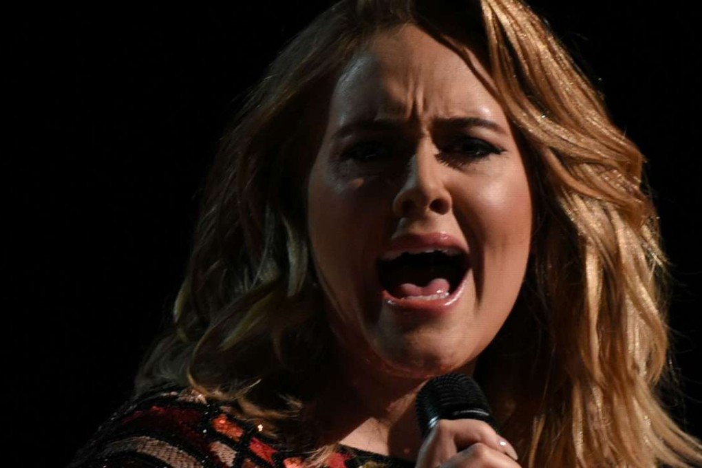 Singer Adele has confirmed years of speculation that she is married, confirming her status at a concert in Brisbane, Australia on Sunday. Photo: AFP