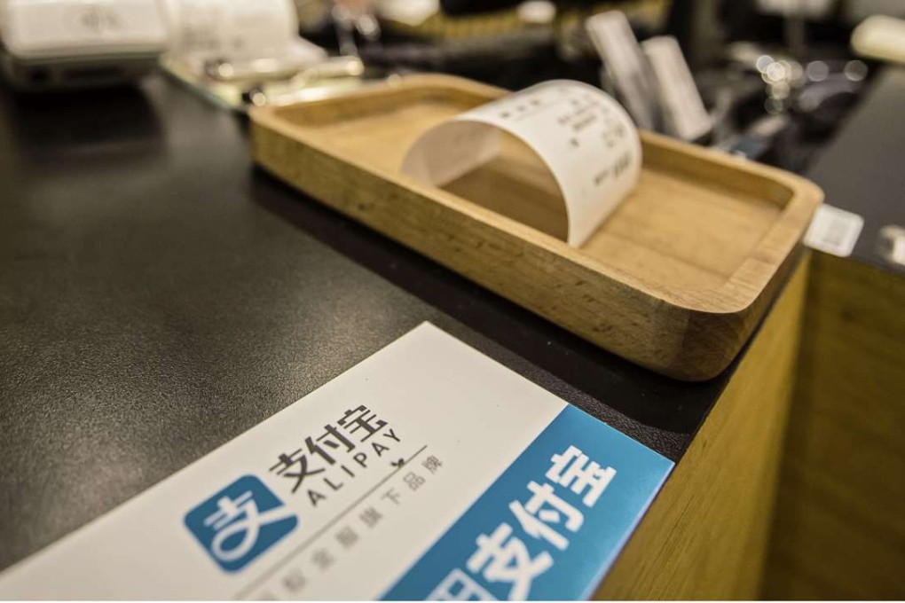 Alipay allows its 450 million users to link their bank or credit cards to its app and make payments on Alibaba’s Taobao and Tmall. Photo: Bloomberg