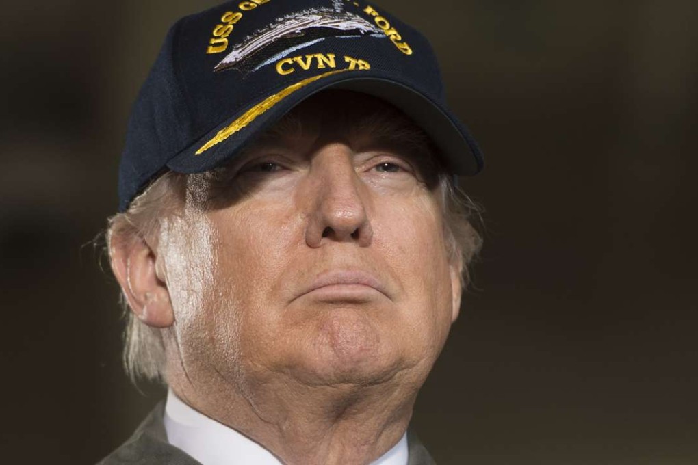 Donald Trump’s newly revised travel ban against people from six Muslim-majority nations was rolled out in low-key fashion on Monday. The US President did not stage any ceremony for the signing of the order, instead leaving it to his cabinet members to take questions. Photo: AFP