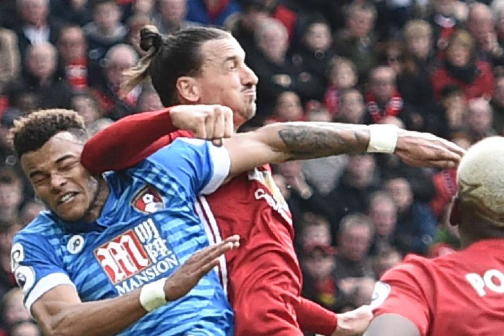 Manchester United's Swedish striker Zlatan Ibrahimovic (right) clashes with Bournemouth's English defender Tyrone Mings during their Premier League game last weekend. Photo: AFP