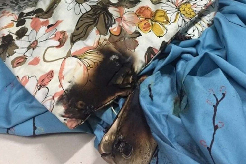 The student posted photos of her burnt phone and bedding on social media. Photo: Handout