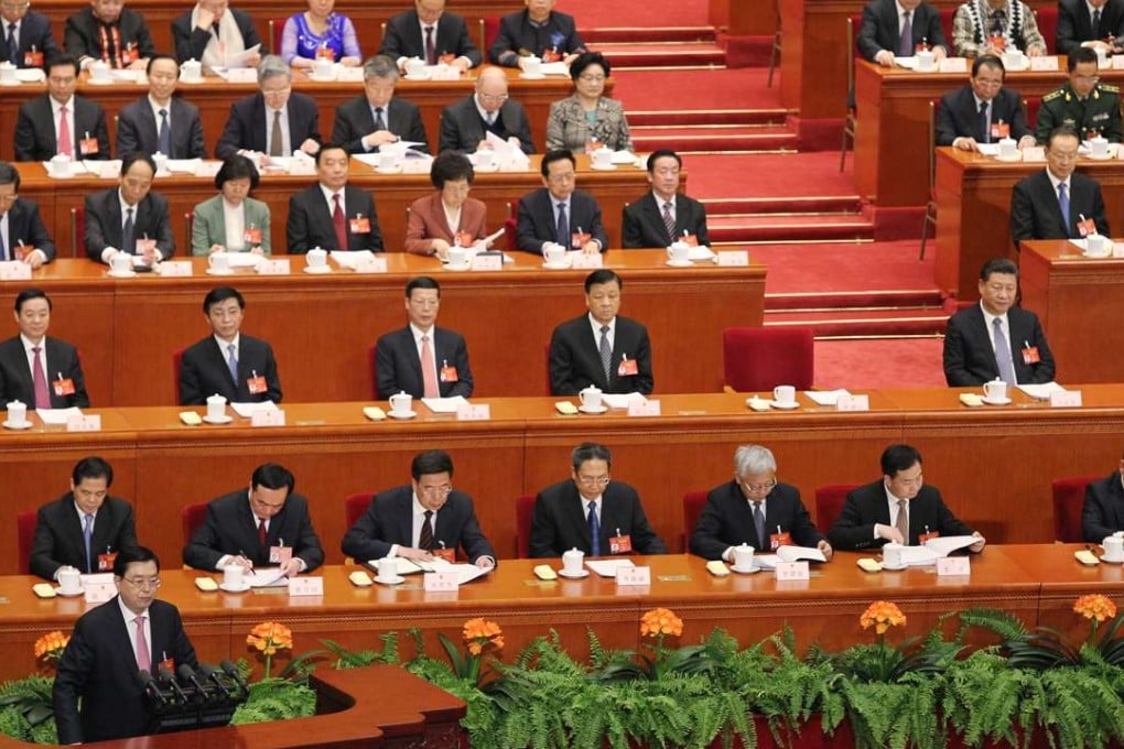 NPC chairman Zhang Dejiang addresses the National People's Congress on Wednesday. Photo: Simon Song