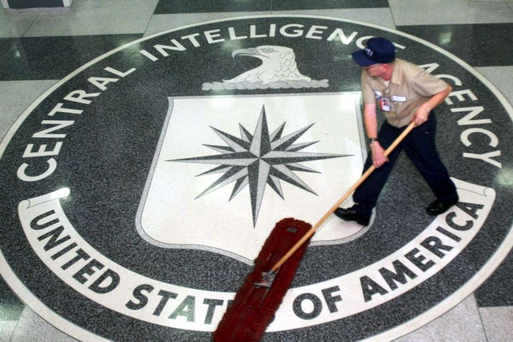 A worker at the CIA sweeping the foyer clean at the CIA headquarters in Langley, Virginia, as whistleblower website WikiLeaks released documents on the agency’s cyber espionage toolkit. Photo: EPA