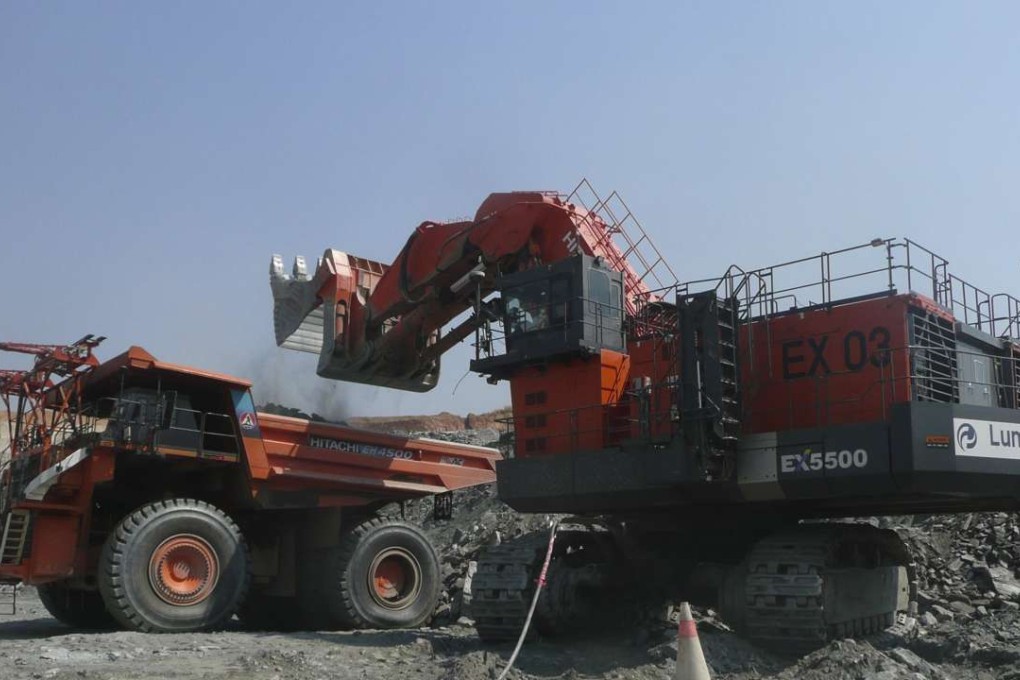 MMG, the overseas mining unit of state-backed China Minmetals, reported a wider than expected loss for 2016. A truck is loaded with rocks at an Equinox copper mine in Lumwana, Zambia. Photo: Handout courtesy of Reuters
