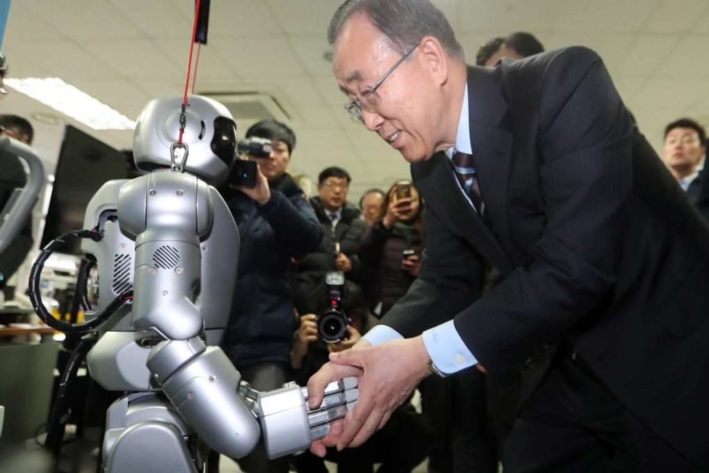 Former UN Secretary-General Ban Ki-moon shakes hands with Hubo, a humanoid robot, during his visit to the Korea Advanced Institute of Science and Technology in Daejeon, South Korea last month. Photo: EPA/YONHAP SOUTH KOREA OUT