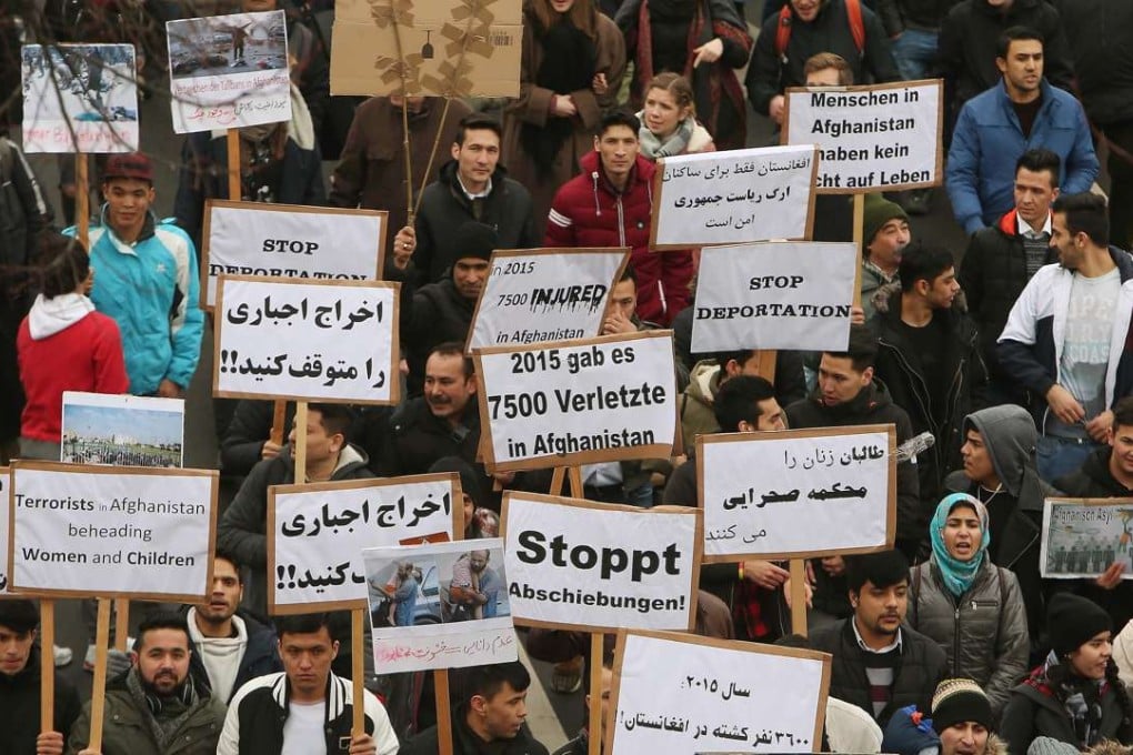 People march against the deportation of immigrants to Afghanistan in Dusseldorf, western Germany on February 11. Photo: AFP