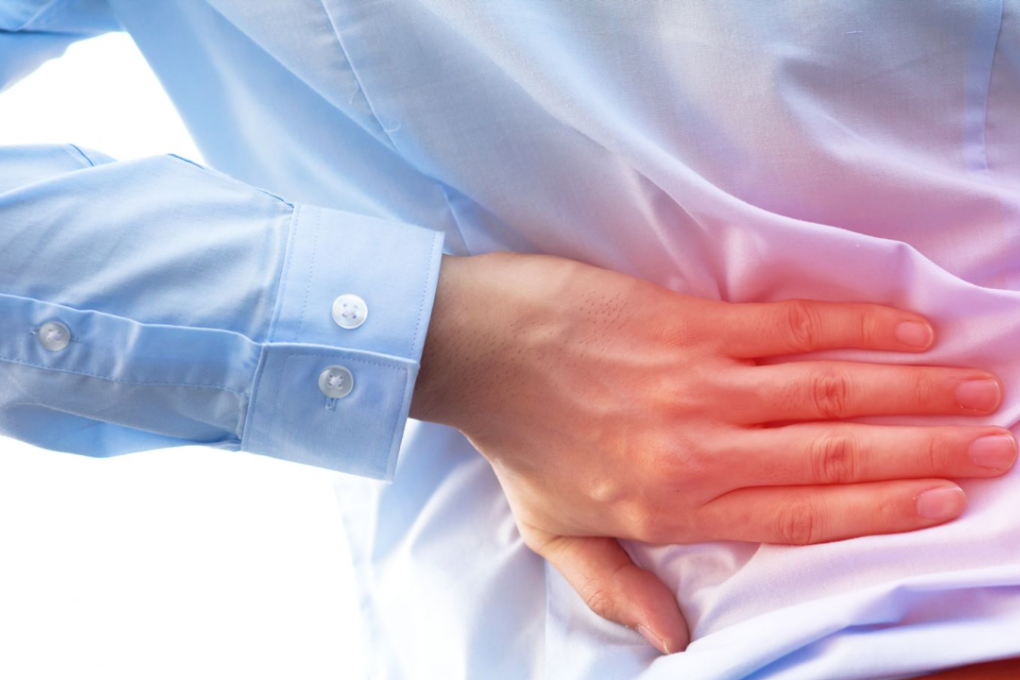 Those back aches can be alleviated by simply watching your posture. Photo: iStock