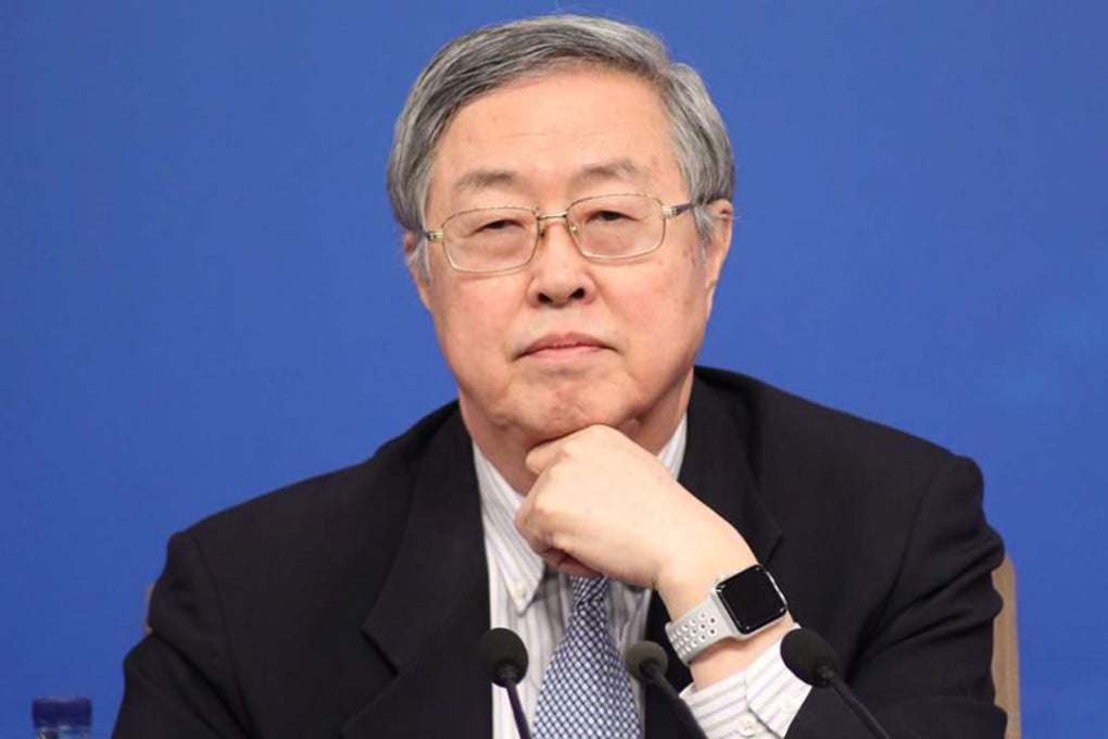 Zhou Xiaochuan, governor of the People's Bank of China, wearing a Apple Watch at the media centre in Beijing. Photo: Simon Song