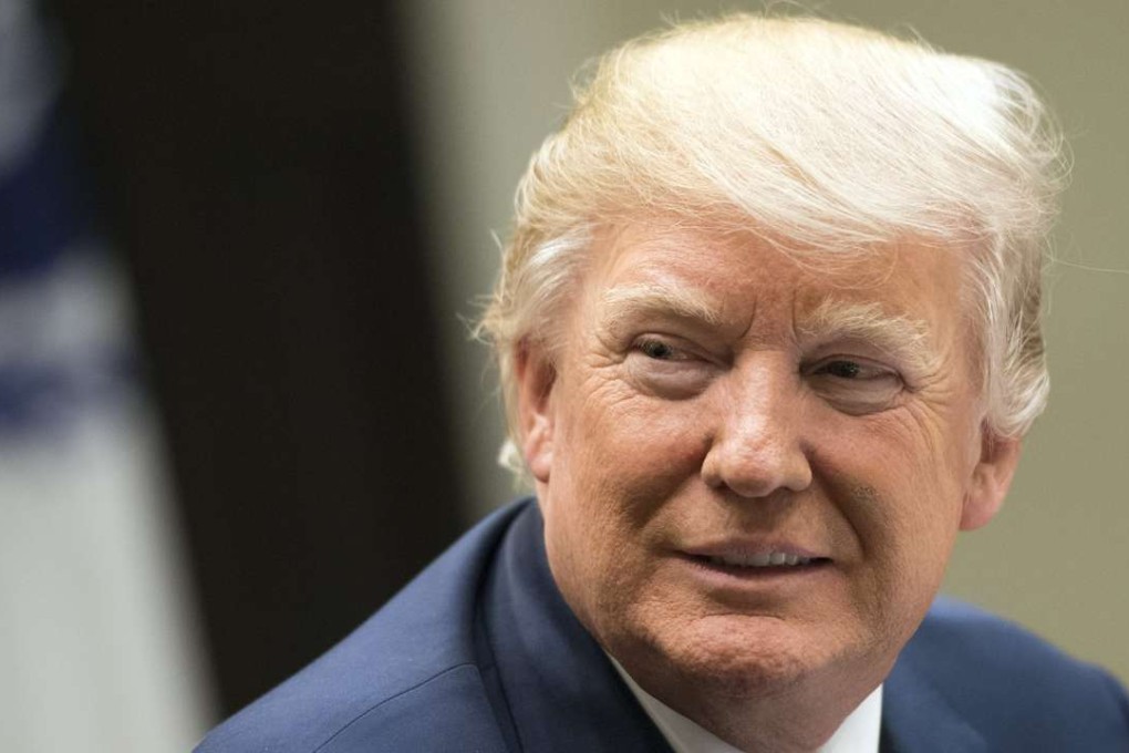 US President Donald Trump holds a National Economic Council listening session with the CEOs of small and community banks, in the Roosevelt Room at the White House in Washington. Photo: EPA