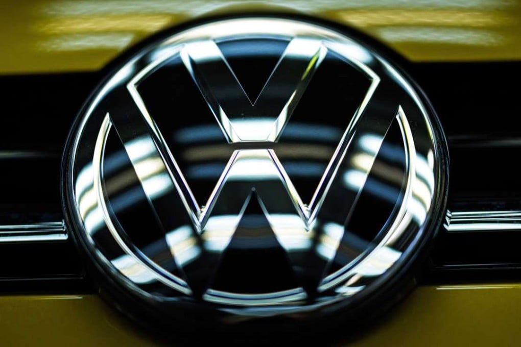 The Volkswagen (VW) logo is on the hood of a car in the quality check line in Volkswagen’s parent plant in Wolfsburg, Germany. The company formally submitted its guilty plea in a US court on Friday over the emissions scandal which rocked the firm. Photo: EPA