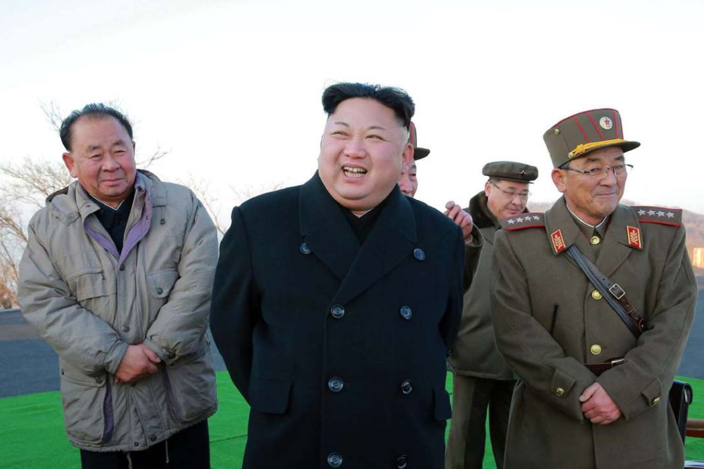 North Korean leader Kim Jong-un supervises the launch of four ballistic missiles on March 6. Photo: AFP