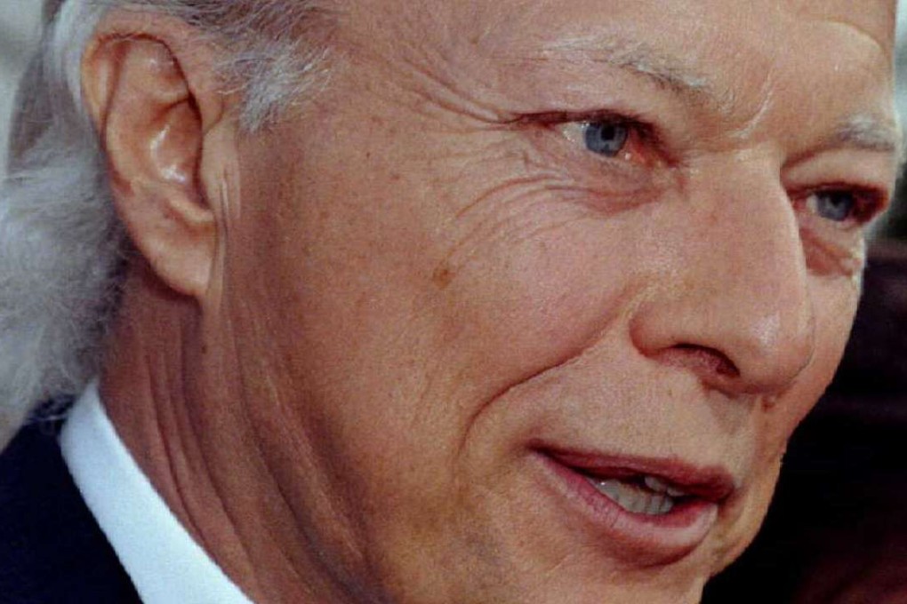 Author Robert James Waller is interviewed at the premiere of the new film "The Bridges of Madison County," which is based on his book of the same name in 1995. Waller has passed away at age 77. Photo: Reuters