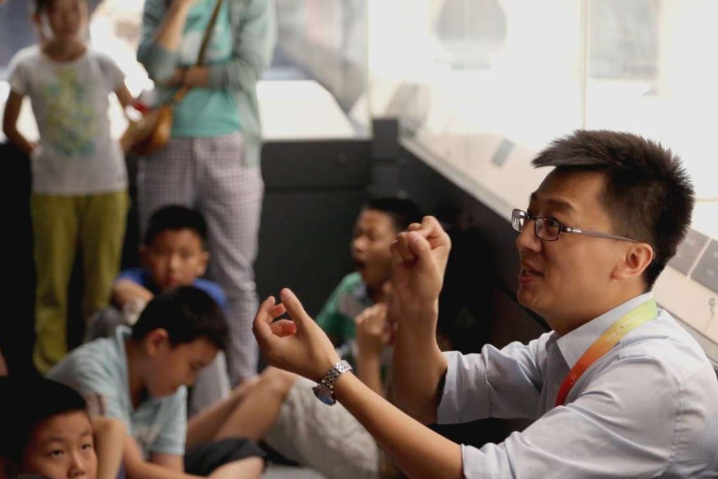 Zhang Peng pictured teaching children. Photo: Handout