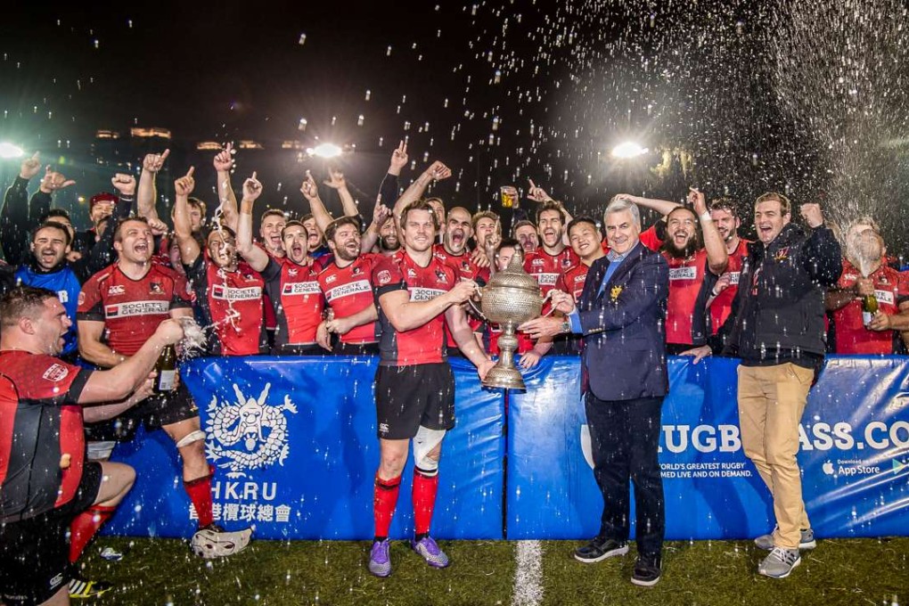 Societe Generale Valley celebrate winning their fifth consecutive grand championship in the Hong Kong Premiership. Photos: HKRU