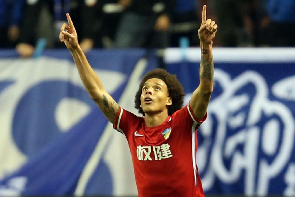 Belgium international Axel Witsel celebrates his goal for Tianjin Quanjian against Shanghai Shenhua. Photos: Xinhua摄