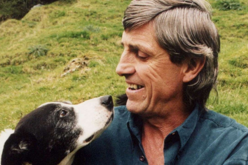 New Zealand cartoonist Murray Ball with his Border collie dog called Finn who became the model for ‘Dog’, the kind-hearted sheep dog of what came to be an internationally syndicated cartoon, Footrot Flats. File photo: AFP