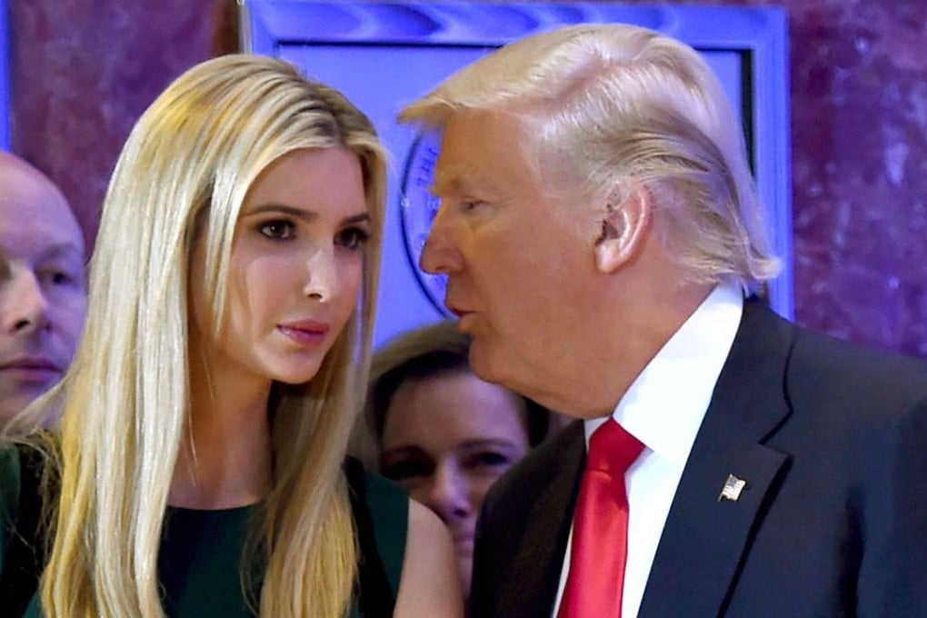 US President-elect Donald Trump talking to his daughter Ivanka during a press conference at Trump Tower in New York. Photo: AFP