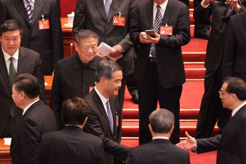 Chief Executive Leung Chun-ying (centre) shakes hands with Premier Li Keqiang. Photo: Simon Song