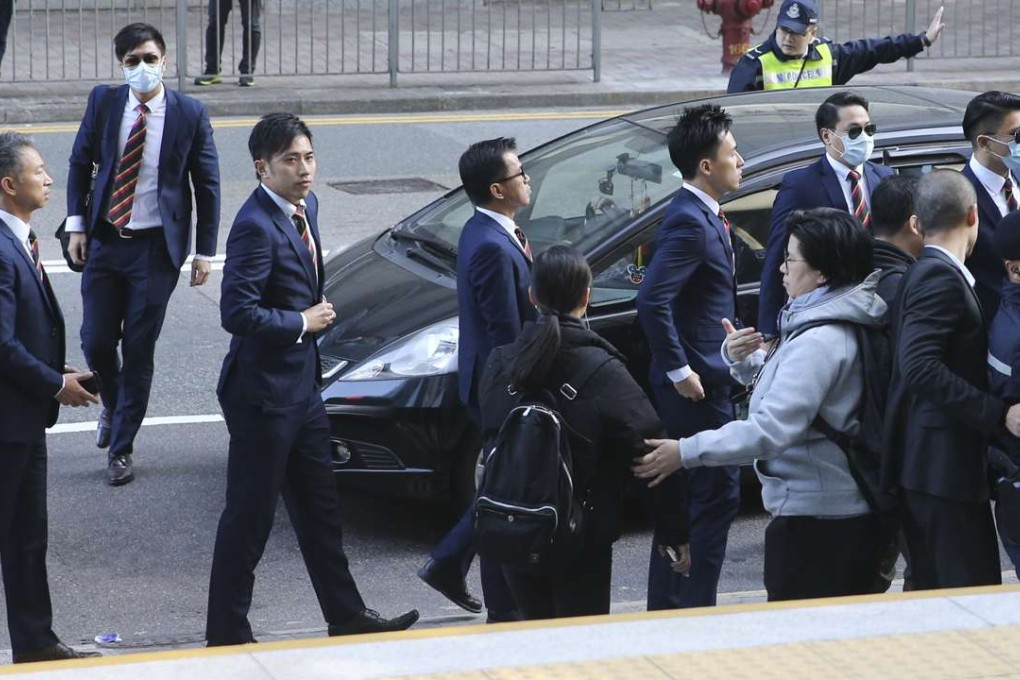 Seven police officers accused of beating Civic Party member Ken Tsang Kin-chiu during the Occupy protests in 2014 arrive at the District Court on February 14. They were found guilty, and the two-year jail term handed down by District Court judge David Dufton three days later sparked outrage among a section of the police force and public. Photo: Sam Tsang