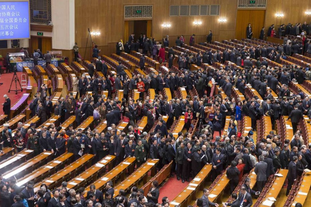 Members of China’s political advisory body leave after the closing meeting at the Great Hall of the People in Beijing on Monday. Photo: Xinhua