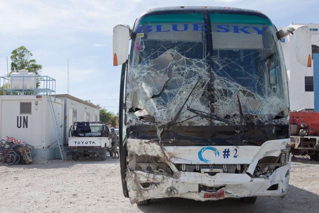 The shattered front of a bus that drove through a crowd of musicians in Gonaives, north of Haiti, on Sunday. Photo: EPA