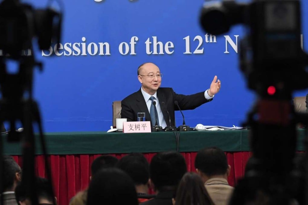 Zhi Shuping, director of the General Administration of Quality Supervision, Inspection and Quarantine, takes questions in Beijing on Tuesday. Photo: Xinhua