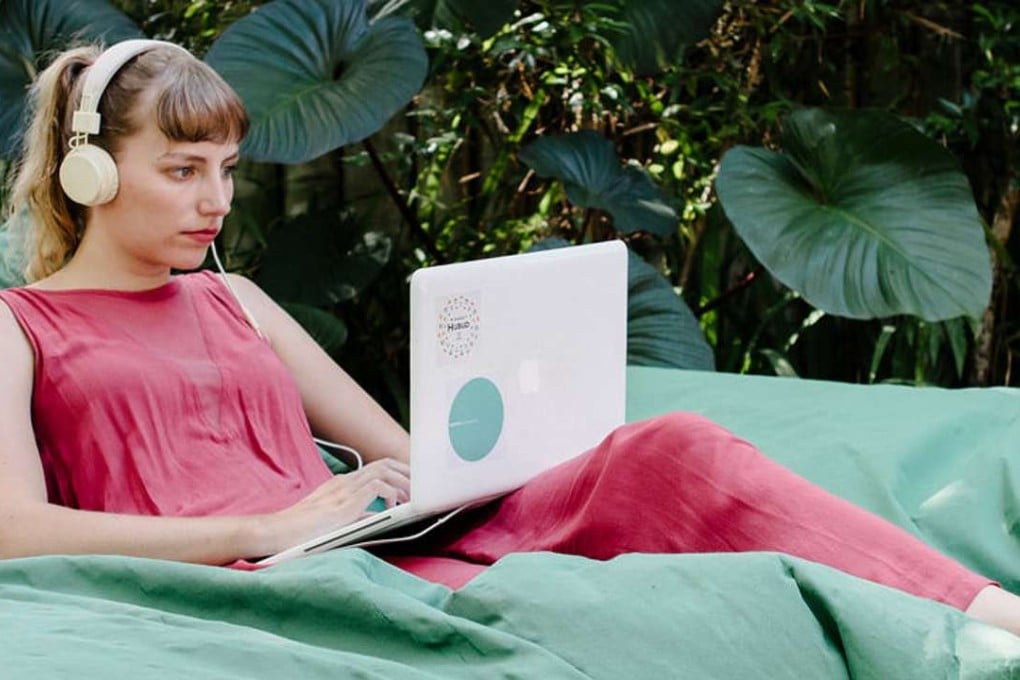 A ‘digital nomad’ working while relaxing at Hubud.