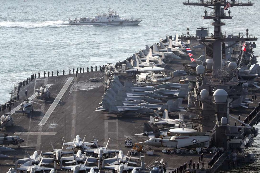 US aircraft carrier USS Carl Vinson arrives for an annual joint military exercise called between South Korea and US, at the port of Busan, South Korea. Photo: Reuters