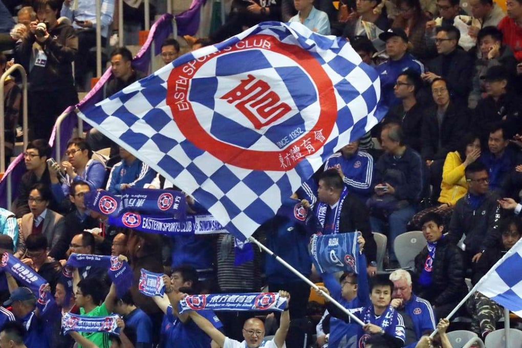 Eastern fans fly the flag at Mong Kok Stadium. Photo: SCMP/ Nora Tam