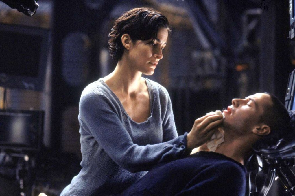 Keanu Reeves (right) and Carrie-Anne Moss in a still from The Matrix.