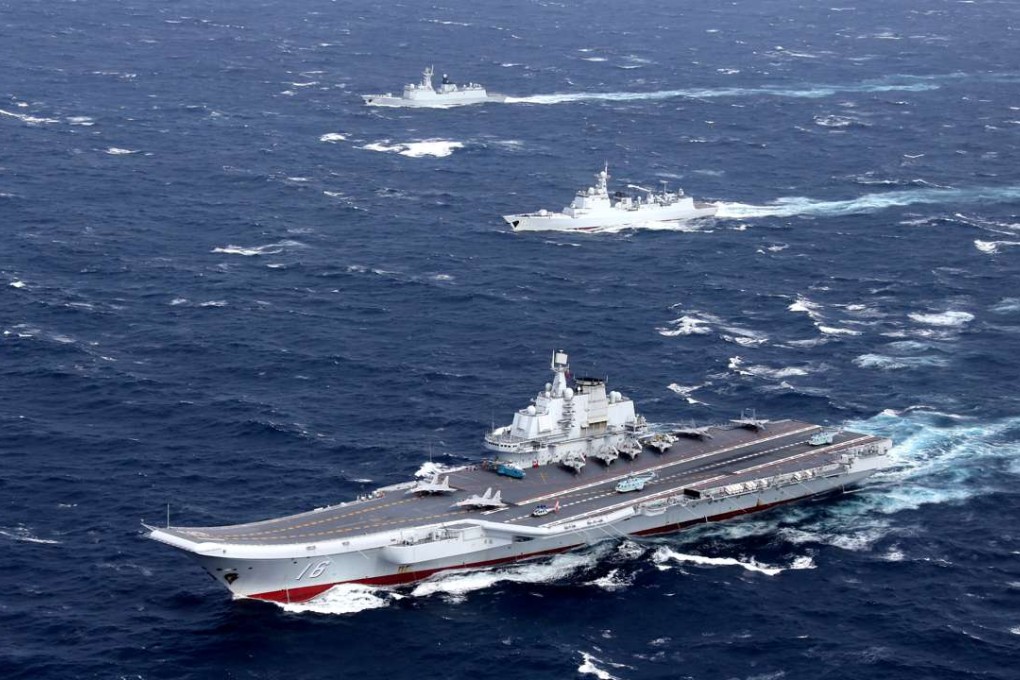FChina's Liaoning aircraft carrier with accompanying fleet conducts a drill in the South China Sea. Photo: Reuters